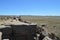 Rockpile ledge of Petrified National Forest desert floor Panorama