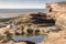 Rockpools and cliff at Hilbre Island, Wirral, England
