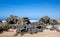 Rocks on a beach with blue sky