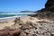 Rocks and beach in Robberg Nature Reserve, South Africa.