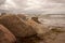 Rocks on beach at sunset