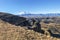 rocks of Bermamyt Plateau and view of Mount Elbrus