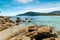 Rocks and blue sea in Cala Pira