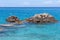 Rocks in the Blue waters of Ionian sea, near Agios Nikitas village