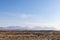 Rocks in a bog with Twelve Bens mountains in background