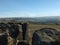 Rocks and boulders on bridestones moor in west yorkshire in sunlight and shadow