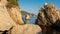 Rocks on Cala de Boadella beach in Lloret de Mar. Scenic sea nature landscape. Cliffs in sea shore in Costa Brava, Spain. Spanish