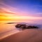 Rocks in Cala Violina beach in Maremma on sunset, Tuscany. Mediterranean sea. Italy.