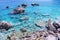 Rocks and crystal clear blue water at Apella Beach, Karpathos Island, Greece