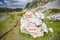 Rocks in the Durmitor mountains in Montenegro. Signpost on the stone at Bobotov kuk and izvor