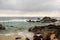 The rocks and fishing stilts in the ocean of Sri Lanka