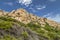 Rocks and mountains behing Bay of Cala Coticcio in Caprera island, Sardinia, Italy