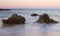 Rocks by ocean shoreline