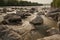 Rocks in a river Bregenzer Ache in summer