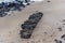 Rocks in the sands of Ondina beach on a sunny day