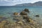 Rocks sea and blue sky, Greek island offshore. Seascape Mytilini.