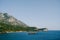 Rocks in the sea and coastline in Montenegro, near the island of Sveti Stefan. Adriatic coast in the balkans.