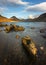 Rocks on shoreline of Britains Favourite View; Wastwater on a beautiful sunny Winter afternoon. Lake District, UK.