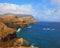 Rocks steeply in the Atlantic Ocean