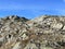 Rocks and stones in the autumn Swiss Alpine environment and in the St. Gotthard pass Gotthardpass mountain area, Airolo