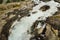 Rocks and stones cliffs with waterfall