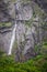 Rocks and stones cliffs with waterfall