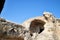 Rocks, stones, stone in the mountain reserve and blue sky on a summer day. Uplistsikhe city in Georgia, Europe