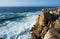 Rocks and waves of surf in the ocean near Cabo Carvoeiro, Peniche peninsula, Portugal