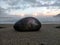 The rocks on the white sand beach, clouds, bright red dawn and the sea are very beautiful in the early morning