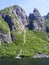 Rockslide between jagged cliff peaks at Western Brook Pond