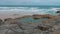 The rocky beach of Bedruthan Steps in Cornwall - an amazing landmark at the Cornish Coast