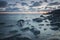 Rocky beach at dusk