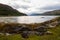 The rocky beach at Elgol on the Isle of Skye in Scotland. minimalist Scottish landscape of a misty morning on a calm, Loch Fada la