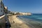 Rocky beach and fortress on the beach of Mura di Tramontana, north of the old town centre of Trapani, Sicily