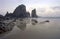 Rocky beach during low tide at dusk