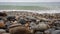 Rocky beach with ocean waves crashing on shore