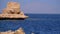 Rocky Beach on Red Sea with Cliff near the Coral Reef. Egypt. Resort on Red Sea Coast.