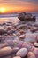 Rocky beach at sunset in Cornwall, England