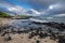 Rocky beach under a cloudy sky