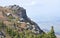 Rocky cliff and alpine landscape