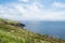 Rocky cliffs along Wild Atlantic Way tourist route on Irish west