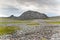 Rocky cliffs on the coast of the Barents Sea along the Varanger Tourist Route, Finnmark, Norway