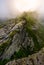 Rocky cliffs of Fagaras mountains in fog