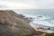 Rocky cliffs with futuristic patterns on the Atlantic coast near the town of Aljezur in southwestern Portugal. The sound of the