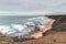 Rocky cliffs with futuristic patterns on the Atlantic coast near the town of Aljezur in southwestern Portugal. The sound of the