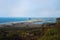 Rocky cliffs, Morro Rock, and Pacific ocean, amazing view from Montana de Oro Bluff trail, CA