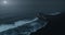 Rocky cliffs and waves at moonlight night aerial view. Landmark Etretat, Normandy, France travel.