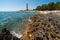 Rocky coast in front of lighthouse - Croatia Dugi Otok