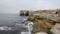 Rocky coast by Portland Bill Lighthouse on the Isle of Portland Dorset England UK