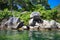 Rocky coast of the volcanic caldera Lake Coatepeque in El Salvador